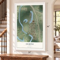 Olmito, Texas map, 24 x 36 inch print in a white frame by a staircase