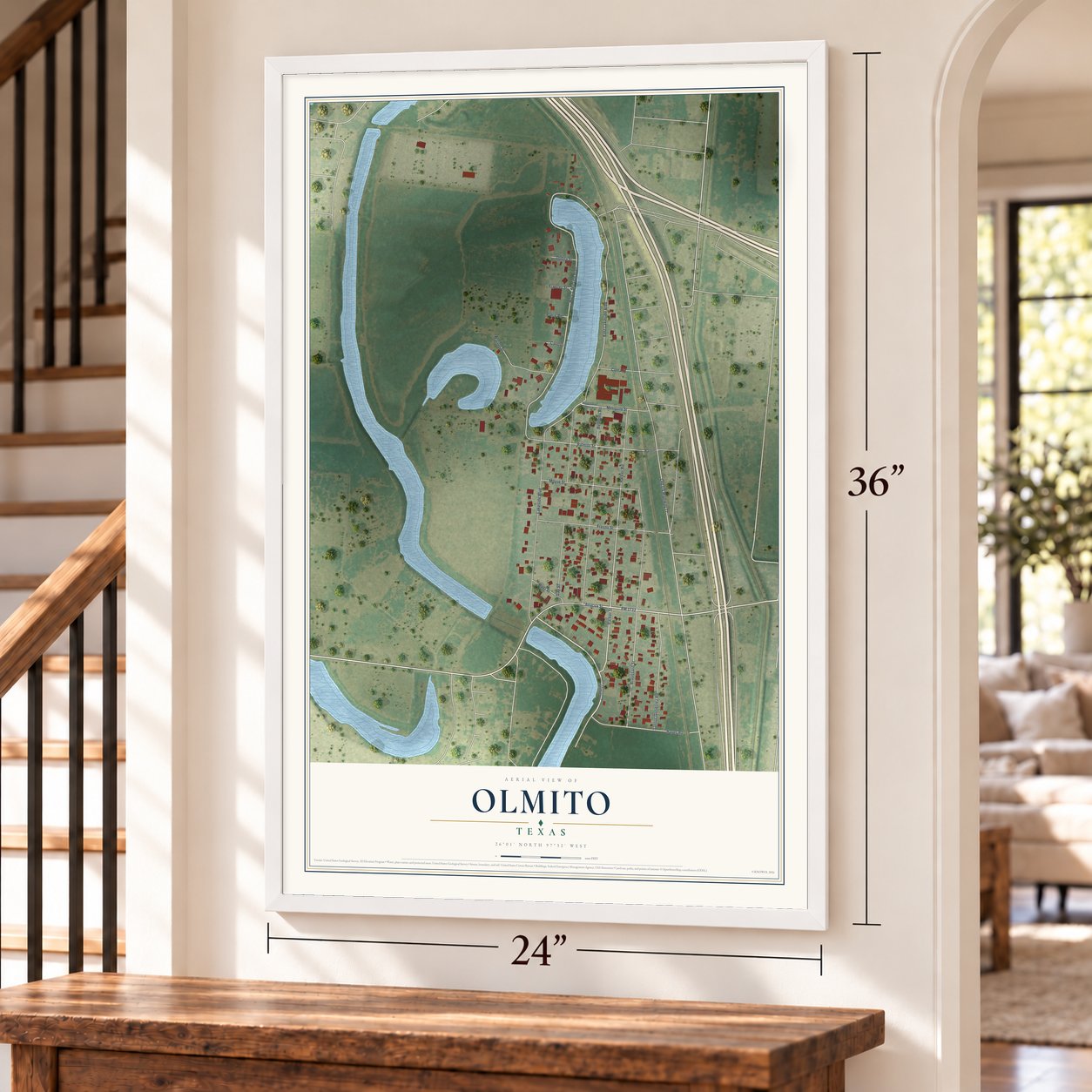 Olmito, Texas map, 24 x 36 inch print in a white frame by a staircase