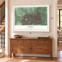 Omaha, Nebraska map, 24 x 36 inch print in a white frame above a dresser by a staircase