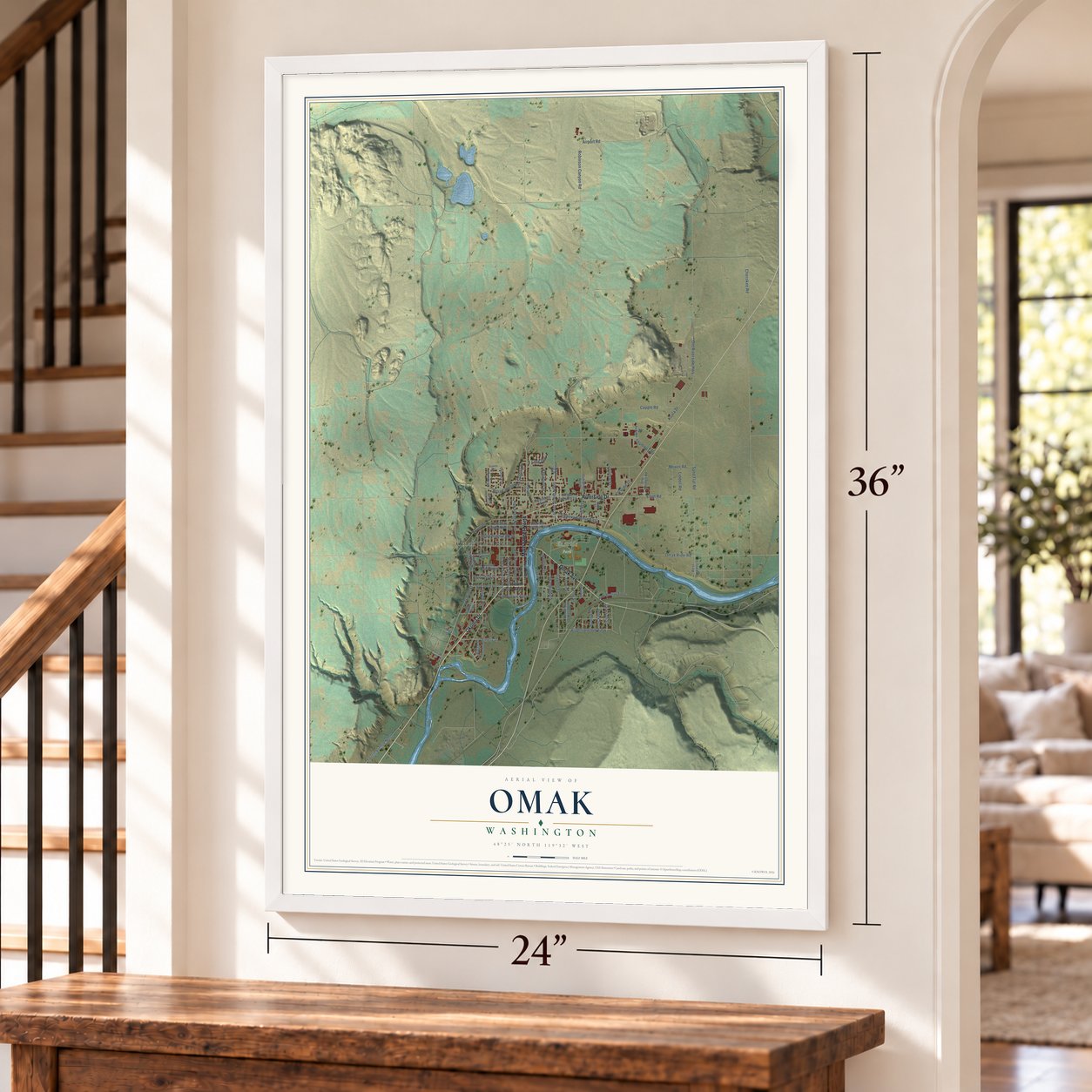 Omak, Washington map, 24 x 36 inch print in a white frame by a staircase