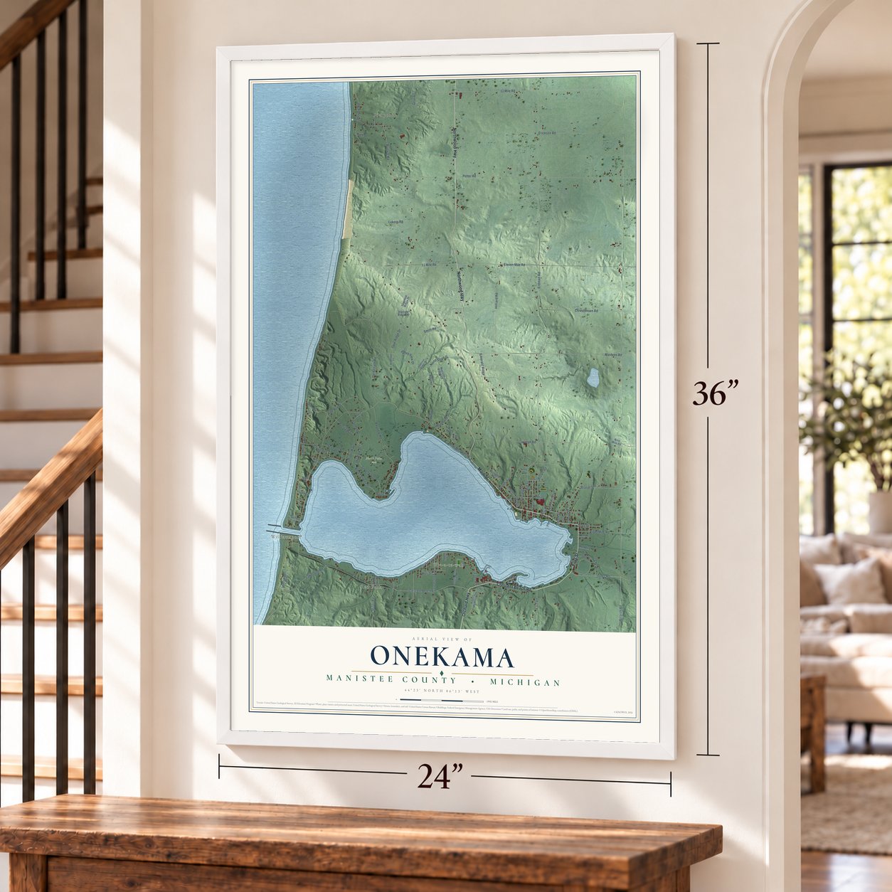 Onekama, Manistee County, Michigan map, 24 x 36 inch print in a white frame by a staircase