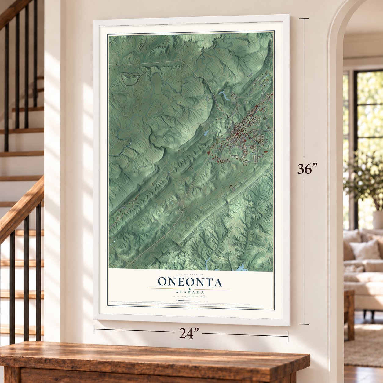 Oneonta, Alabama map, 24 x 36 inch print in a white frame by a staircase