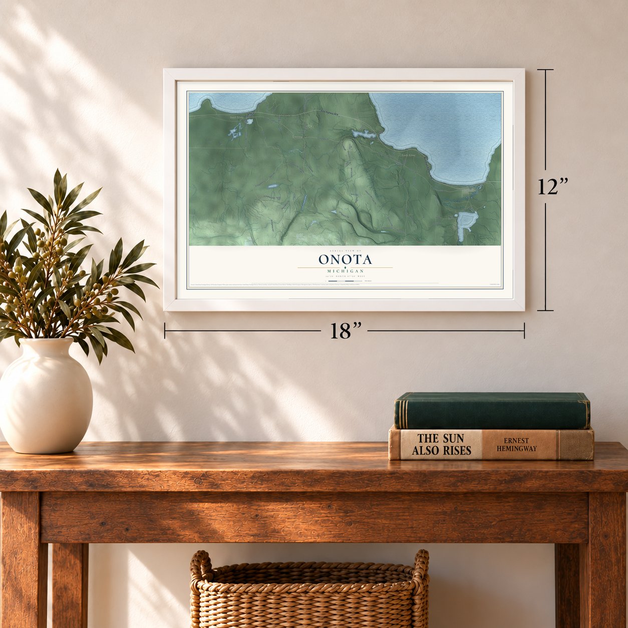 Onota, Michigan map, 12 x 18 inch print in a white frame in an entryway