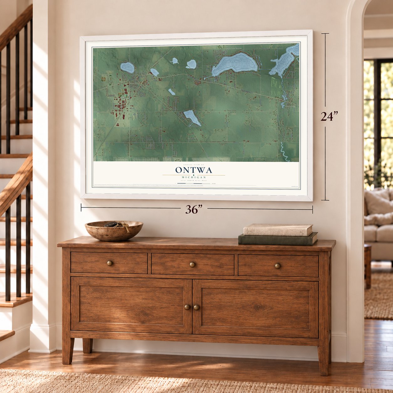 Ontwa, Michigan map, 24 x 36 inch print in a white frame above a dresser by a staircase
