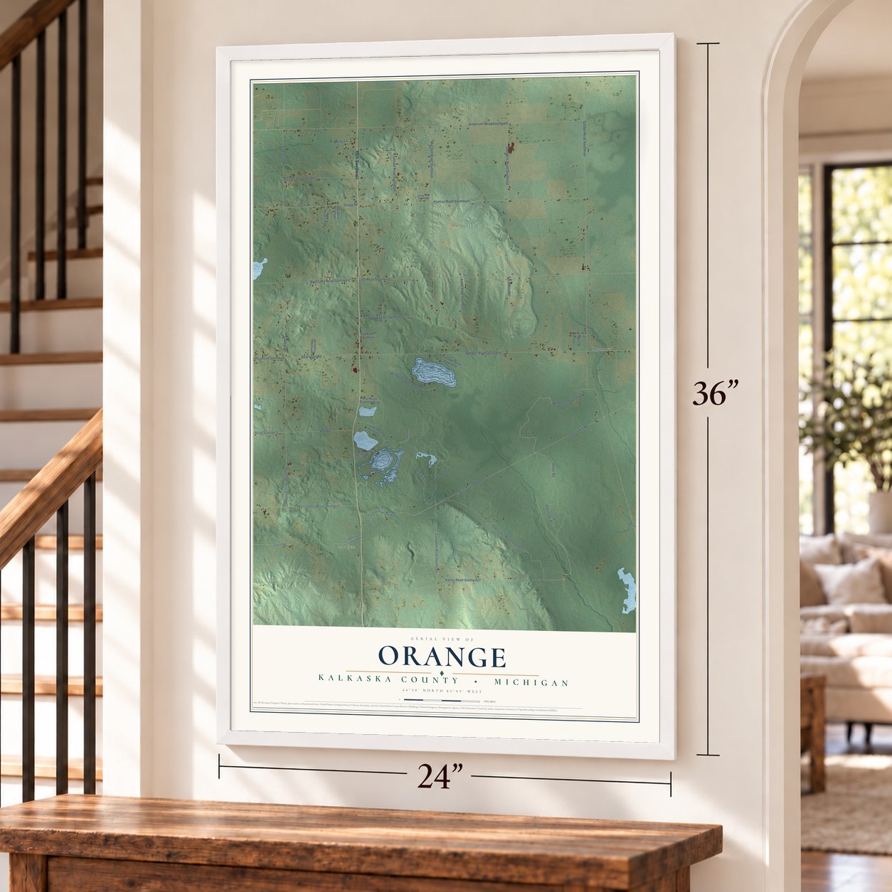 Orange, Kalkaska County, Michigan map, 24 x 36 inch print in a white frame by a staircase