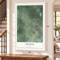 Orange, Texas map, 24 x 36 inch print in a white frame by a staircase