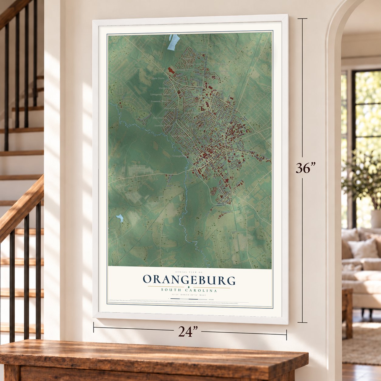 Orangeburg, South Carolina map, 24 x 36 inch print in a white frame by a staircase