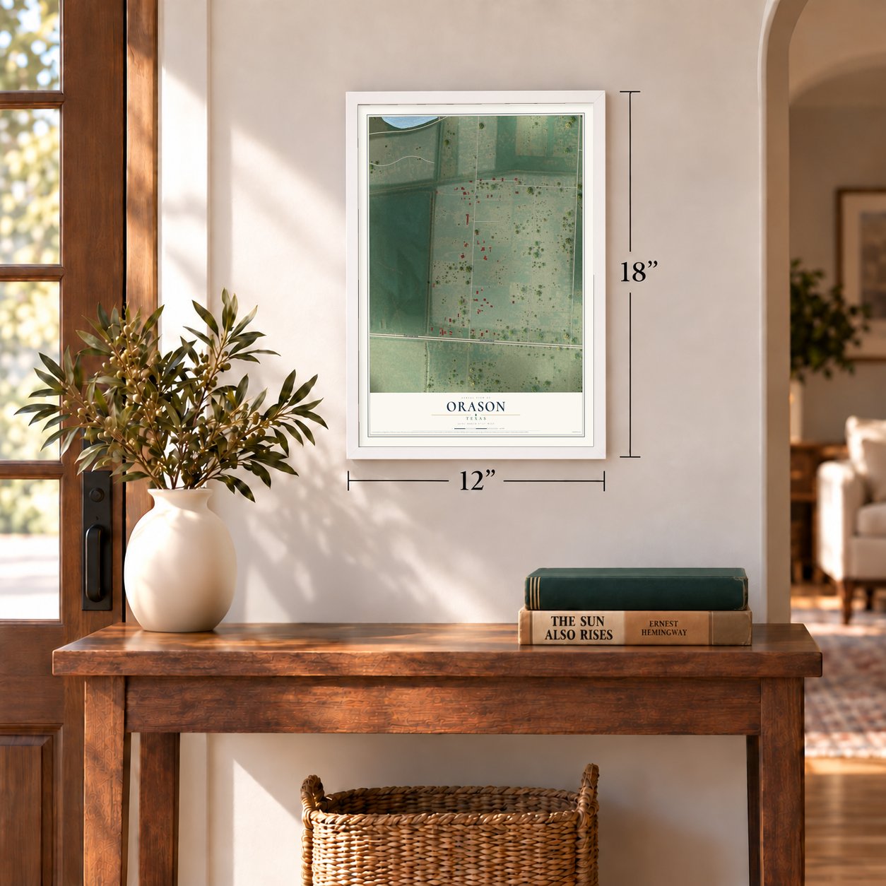 Orason, Texas map, 12 x 18 inch print in a white frame in an entryway