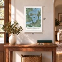 Orchard Lake Village, Michigan map, 12 x 18 inch print in a white frame in an entryway