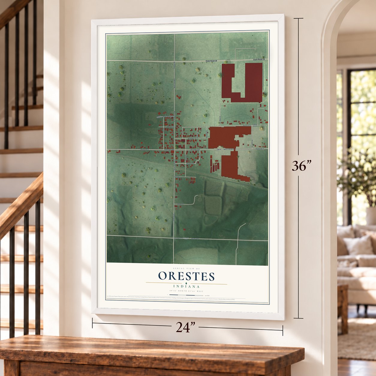 Orestes, Indiana map, 24 x 36 inch print in a white frame by a staircase