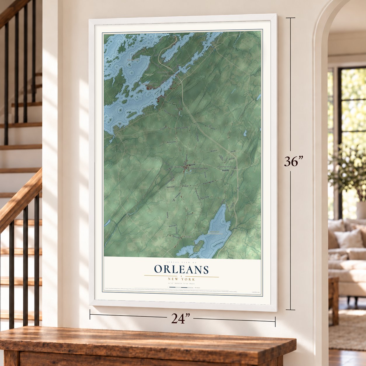 Orleans, New York map, 24 x 36 inch print in a white frame by a staircase