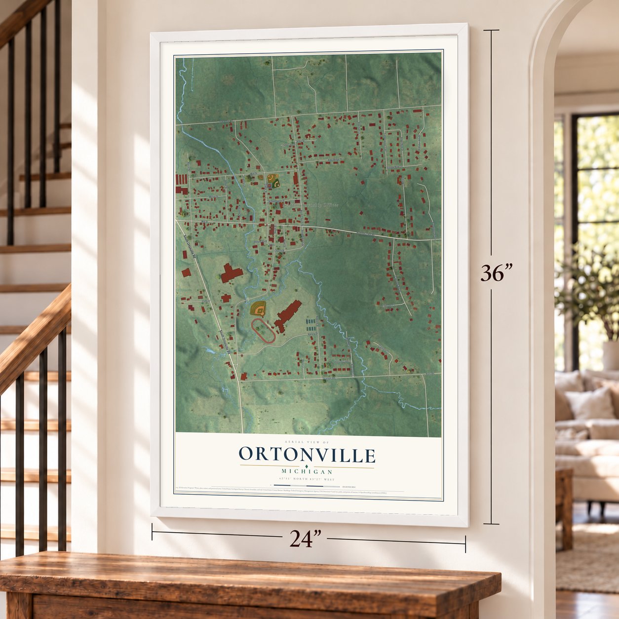 Ortonville, Michigan map, 24 x 36 inch print in a white frame by a staircase