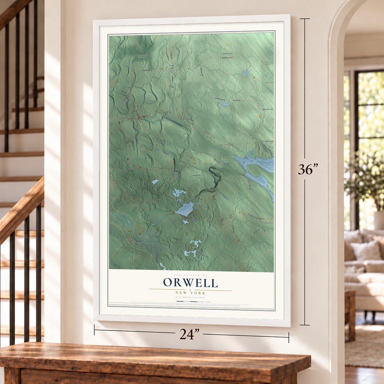 Orwell, New York map, 24 x 36 inch print in a white frame by a staircase