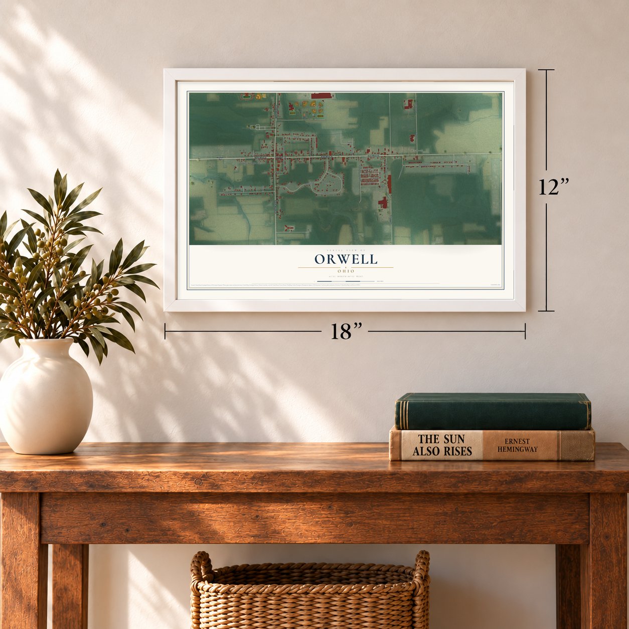 Orwell, Ohio map, 12 x 18 inch print in a white frame in an entryway