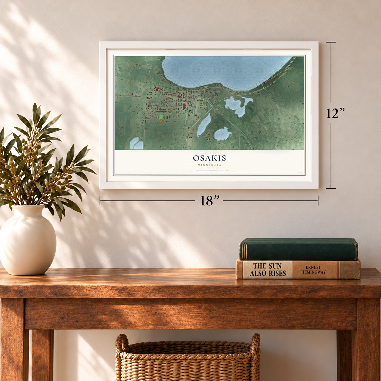 Osakis, Minnesota map, 12 x 18 inch print in a white frame in an entryway
