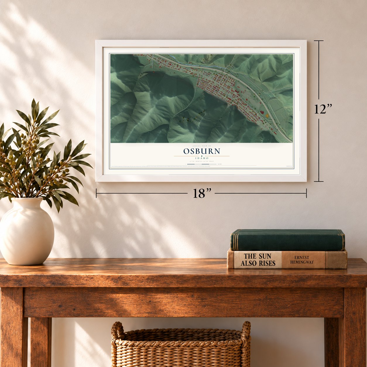 Osburn, Idaho map, 12 x 18 inch print in a white frame in an entryway
