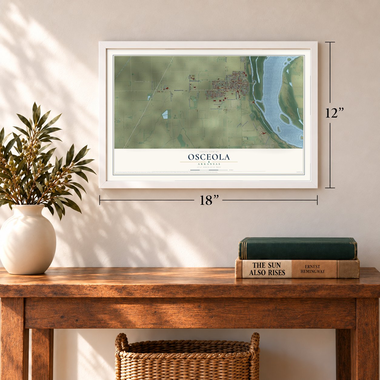 Osceola, Arkansas map, 12 x 18 inch print in a white frame in an entryway