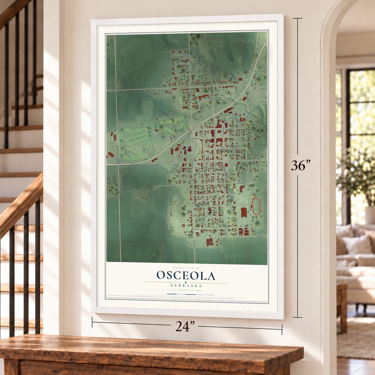 Osceola, Nebraska map, 24 x 36 inch print in a white frame by a staircase