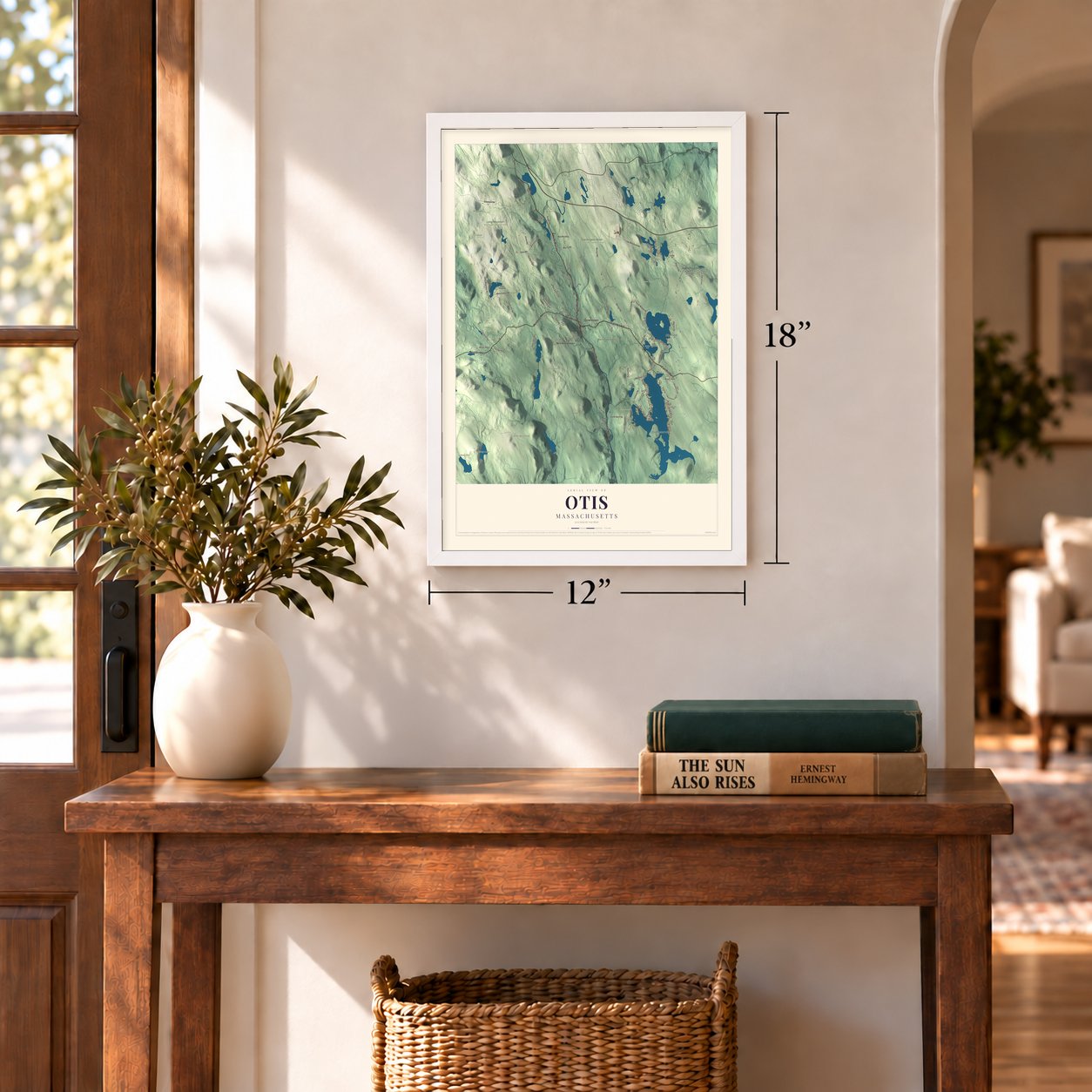 Otis, Massachusetts map, 12 x 18 inch print in a white frame in an entryway