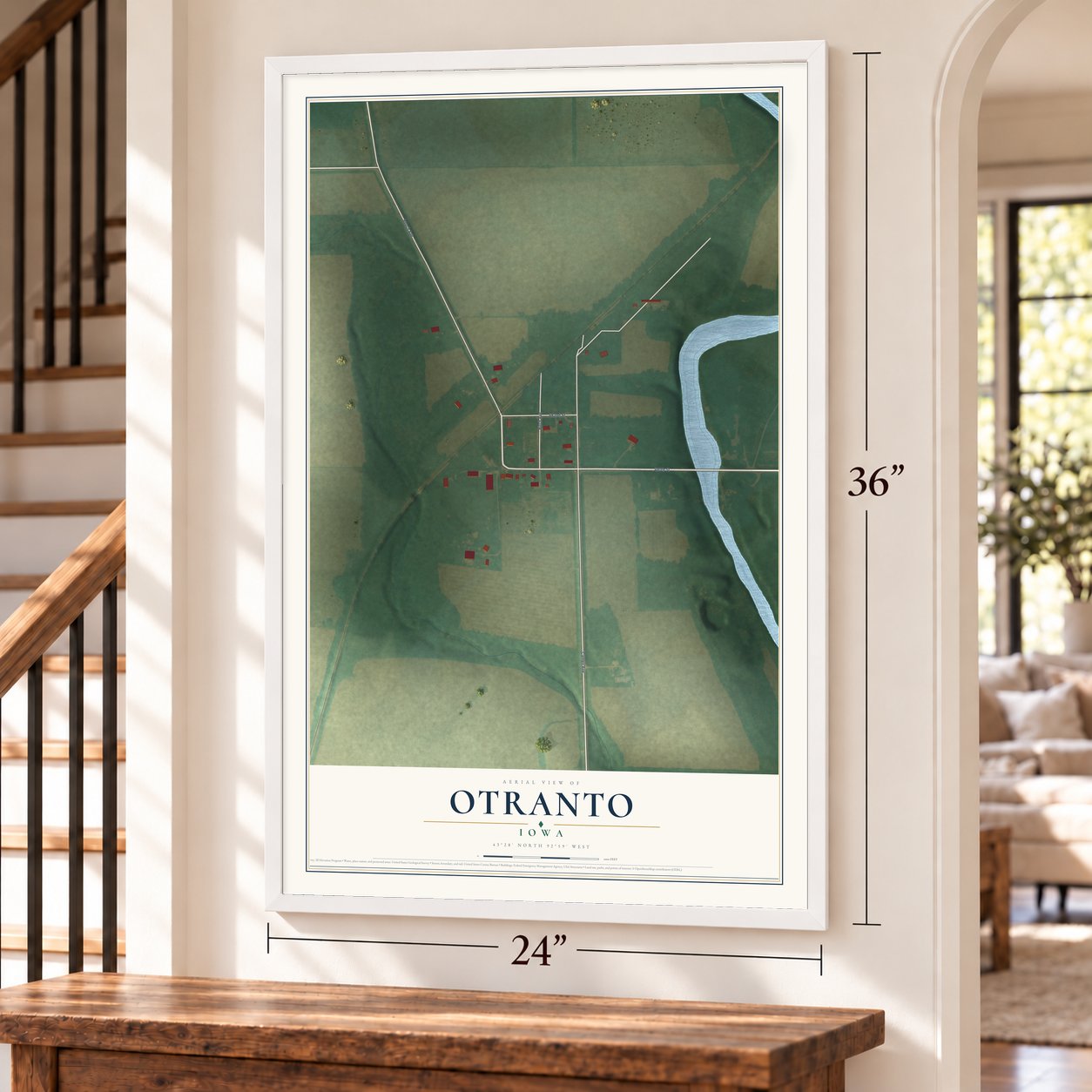 Otranto, Iowa map, 24 x 36 inch print in a white frame by a staircase