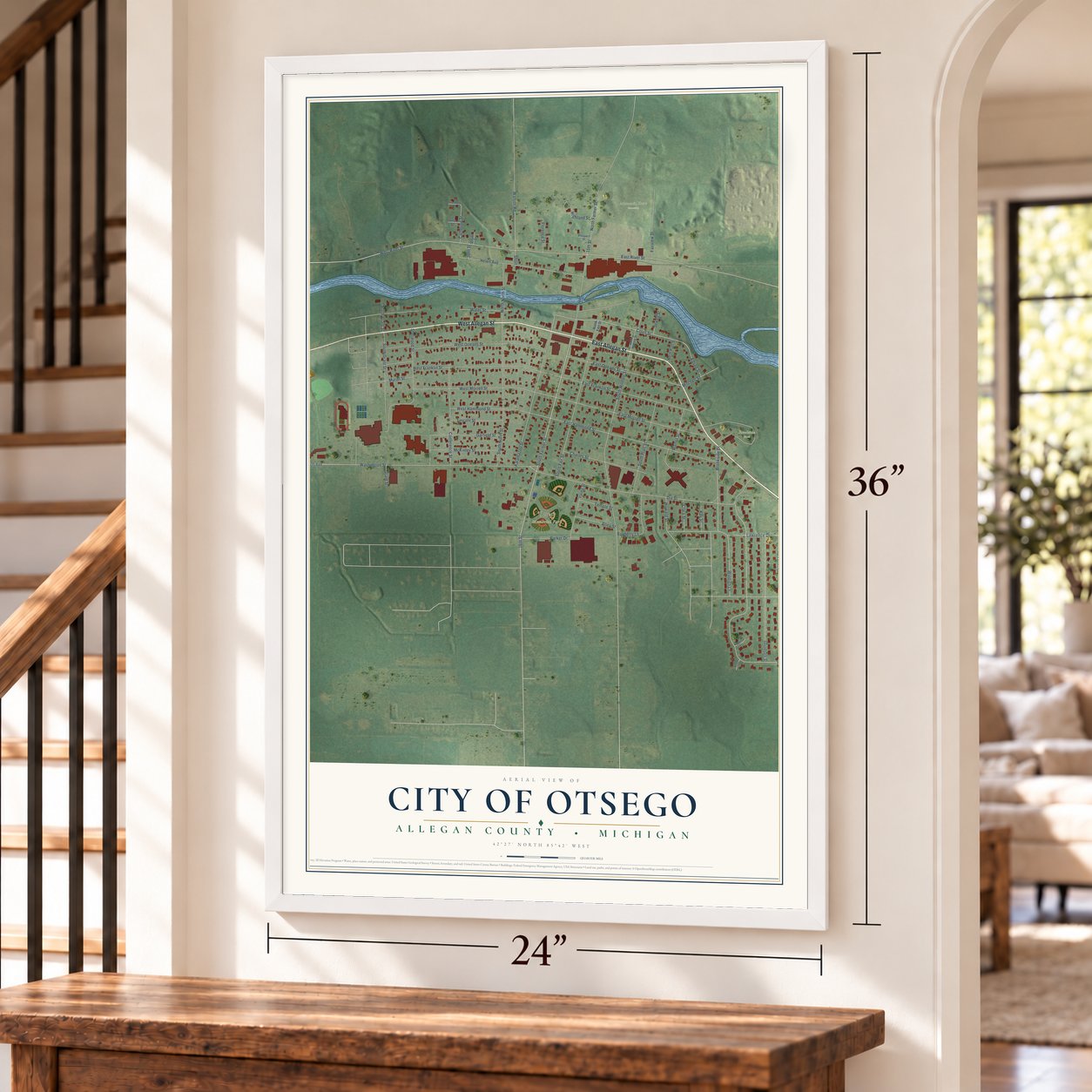 Otsego, Michigan map, 24 x 36 inch print in a white frame by a staircase