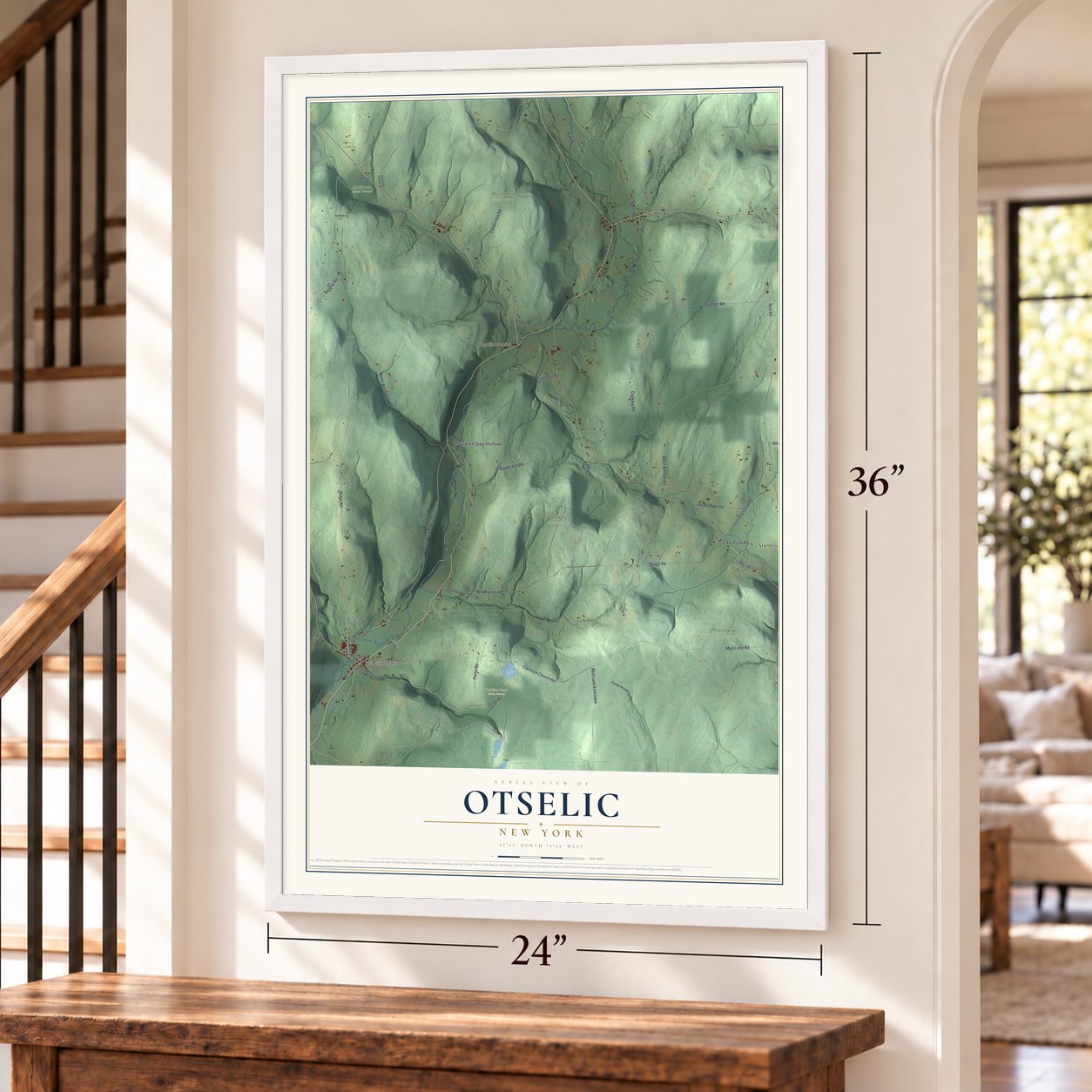 Otselic, New York map, 24 x 36 inch print in a white frame by a staircase