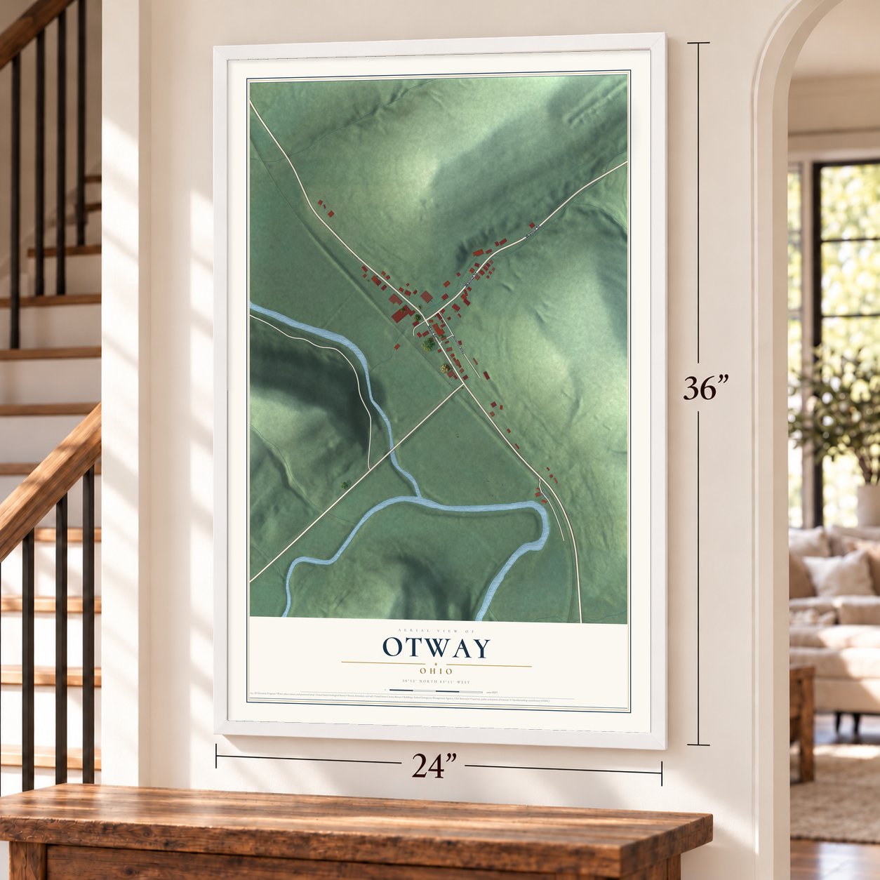 Otway, Ohio map, 24 x 36 inch print in a white frame by a staircase