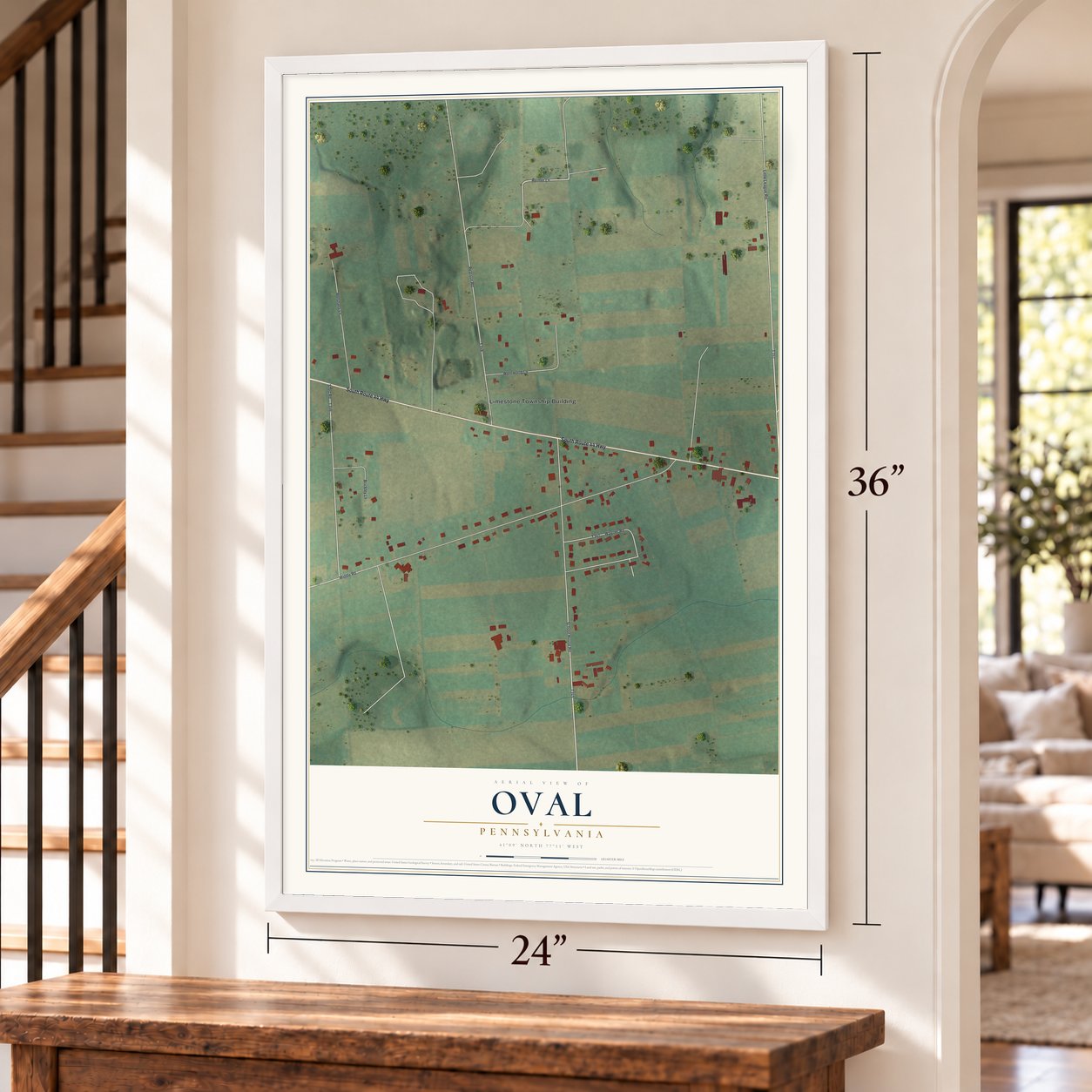 Oval, Pennsylvania map, 24 x 36 inch print in a white frame by a staircase