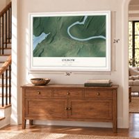 Oxbow, New York map, 24 x 36 inch print in a white frame above a dresser by a staircase