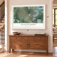 Oxford, Michigan map, 24 x 36 inch print in a white frame above a dresser by a staircase