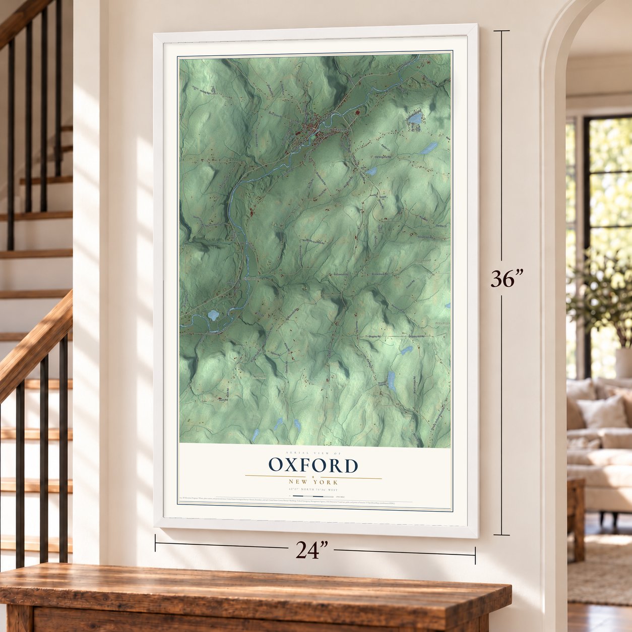 Oxford, New York map, 24 x 36 inch print in a white frame by a staircase