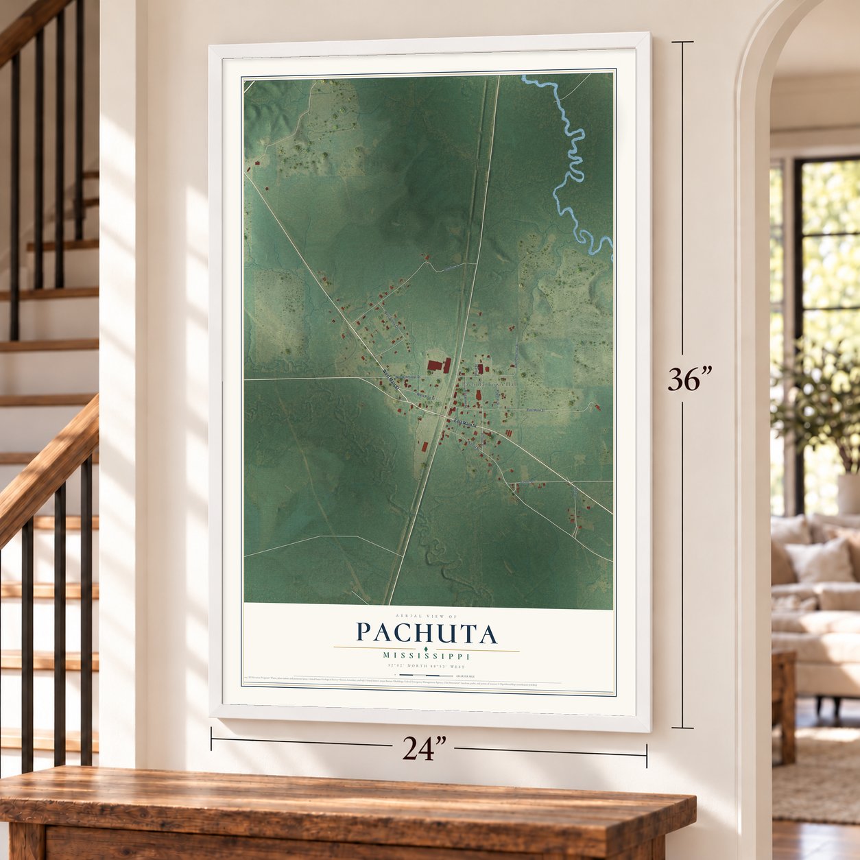 Pachuta, Mississippi map, 24 x 36 inch print in a white frame by a staircase