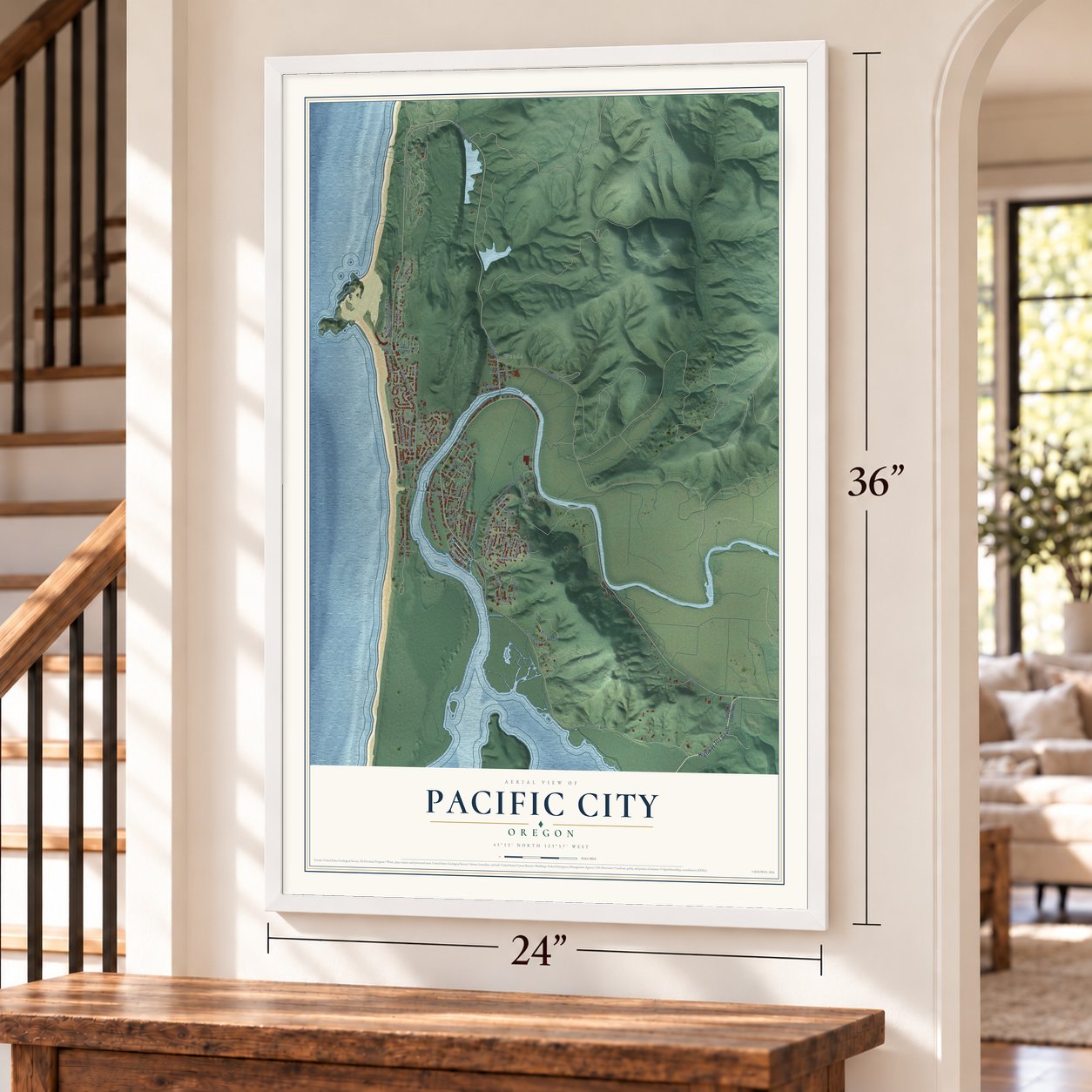 Pacific City, Oregon map, 24 x 36 inch print in a white frame by a staircase