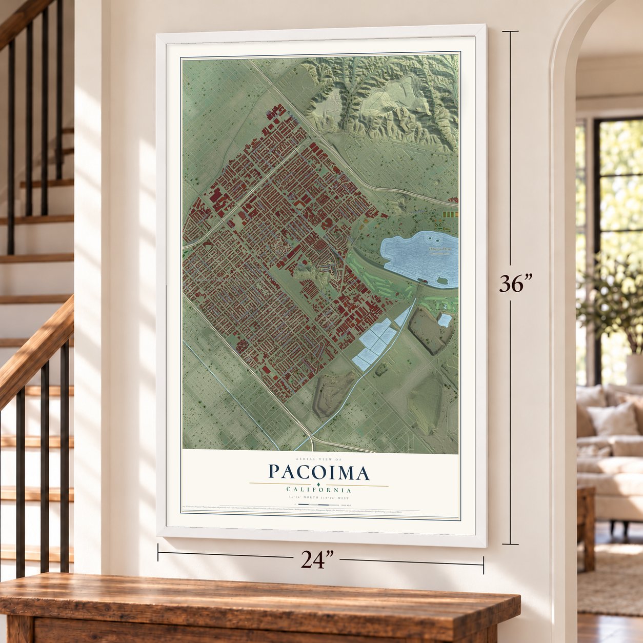 Pacoima, California map, 24 x 36 inch print in a white frame by a staircase