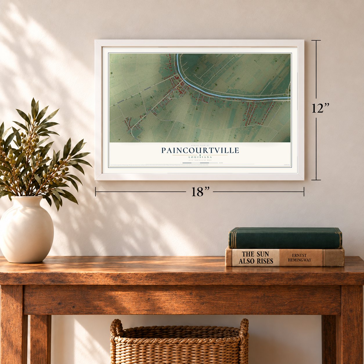 Paincourtville, Louisiana map, 12 x 18 inch print in a white frame in an entryway