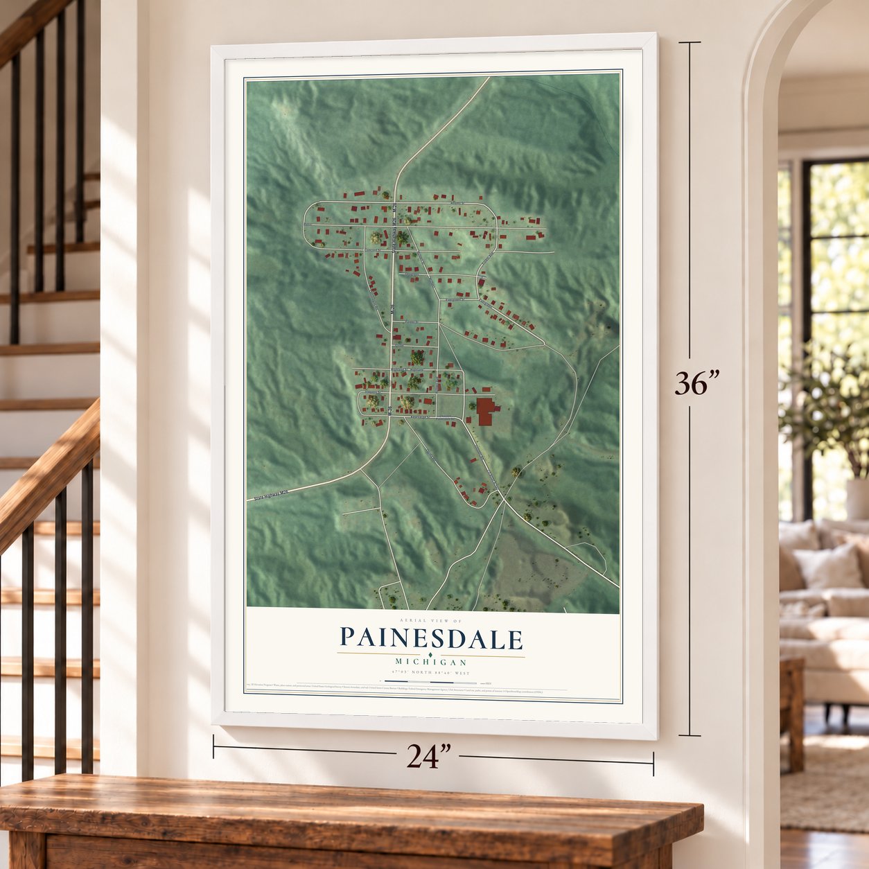 Painesdale, Michigan map, 24 x 36 inch print in a white frame by a staircase