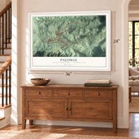 Palomas, Puerto Rico map, 24 x 36 inch print in a white frame above a dresser by a staircase