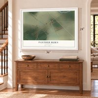 Panther Burn, Mississippi map, 24 x 36 inch print in a white frame above a dresser by a staircase