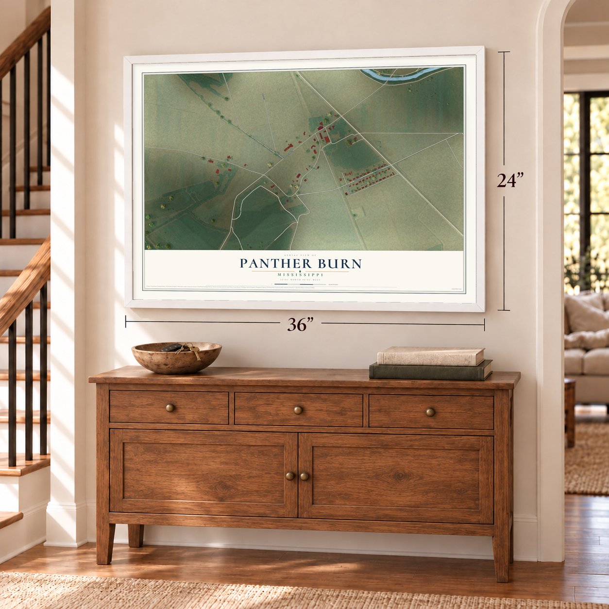 Panther Burn, Mississippi map, 24 x 36 inch print in a white frame above a dresser by a staircase