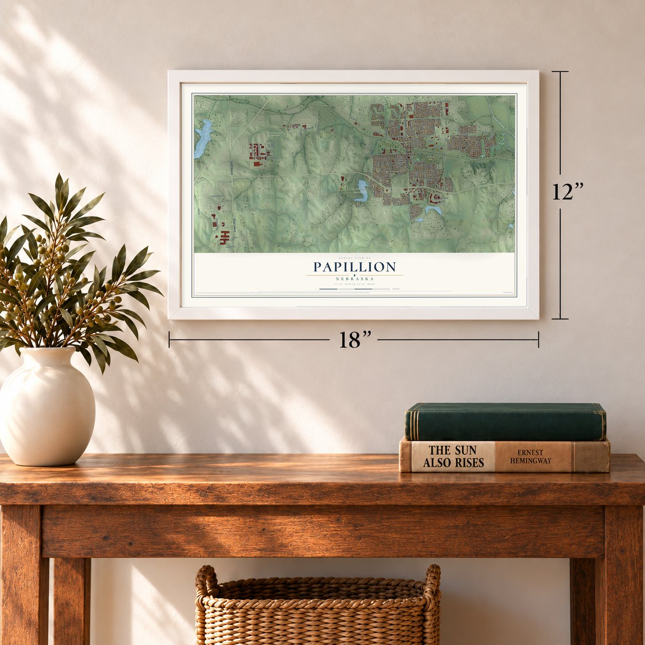 Papillion, Nebraska map, 12 x 18 inch print in a white frame in an entryway