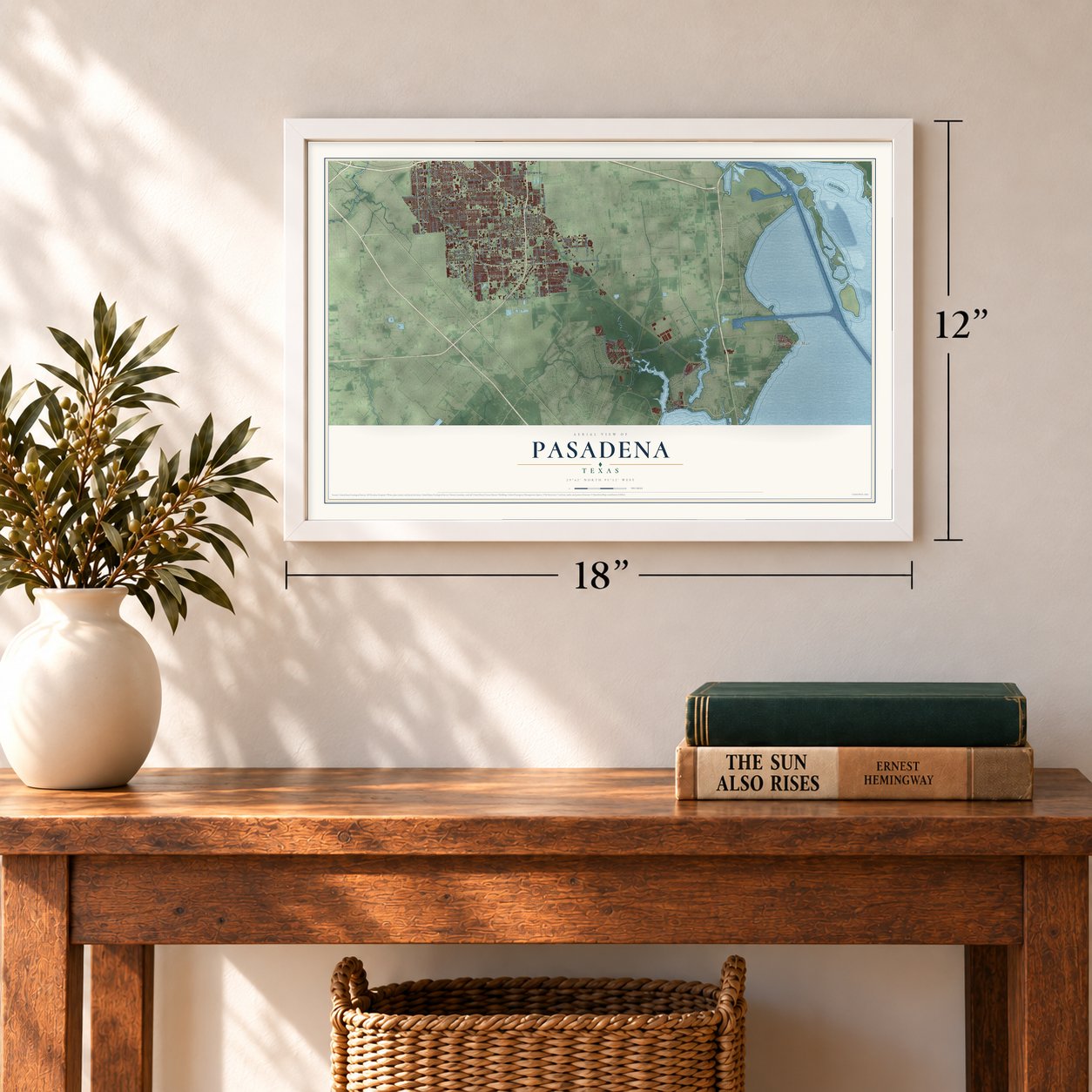 Pasadena, Texas map, 12 x 18 inch print in a white frame in an entryway
