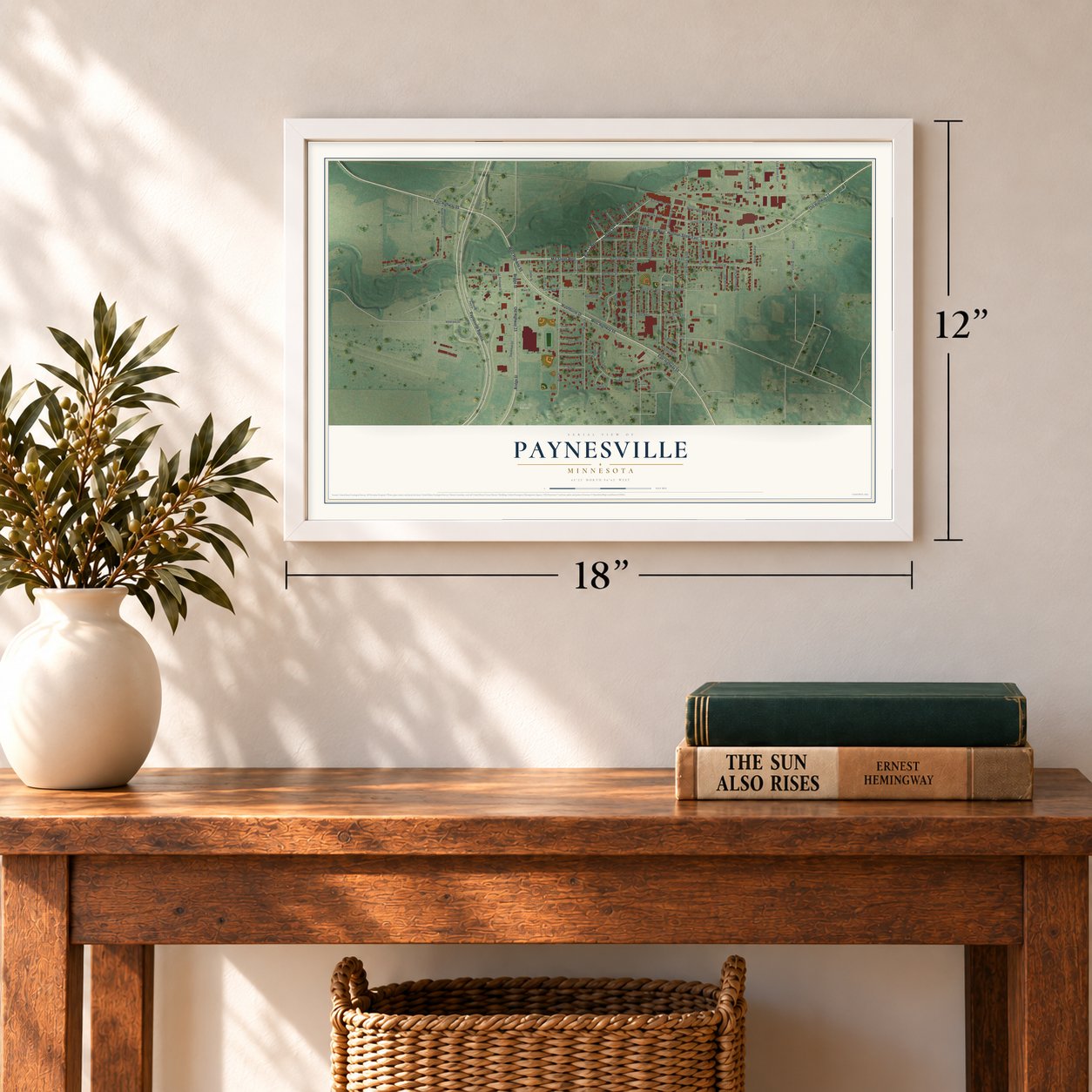 Paynesville, Minnesota map, 12 x 18 inch print in a white frame in an entryway