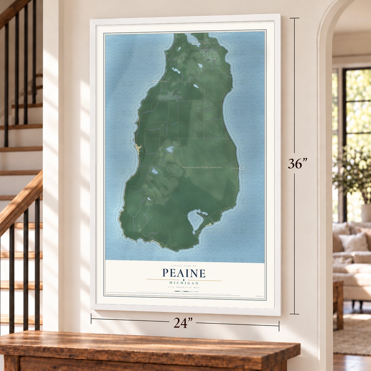 Peaine, Michigan map, 24 x 36 inch print in a white frame by a staircase