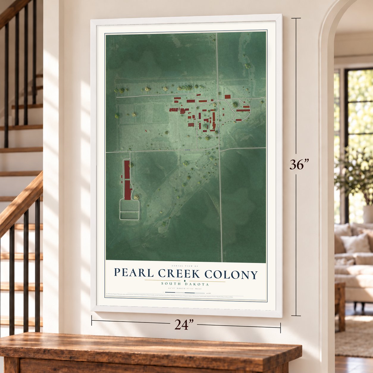 Pearl Creek Colony, South Dakota map, 24 x 36 inch print in a white frame by a staircase