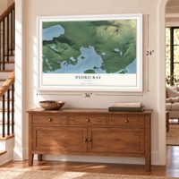 Pedro Bay, Alaska map, 24 x 36 inch print in a white frame above a dresser by a staircase
