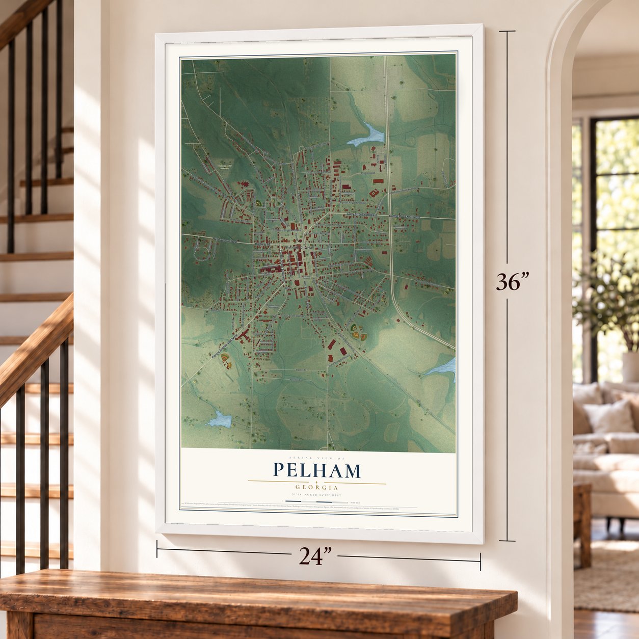 Pelham, Georgia map, 24 x 36 inch print in a white frame by a staircase