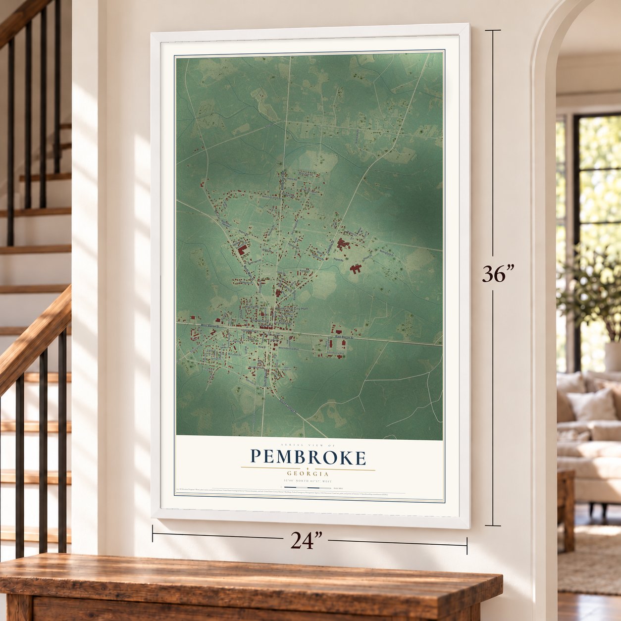Pembroke, Georgia map, 24 x 36 inch print in a white frame by a staircase