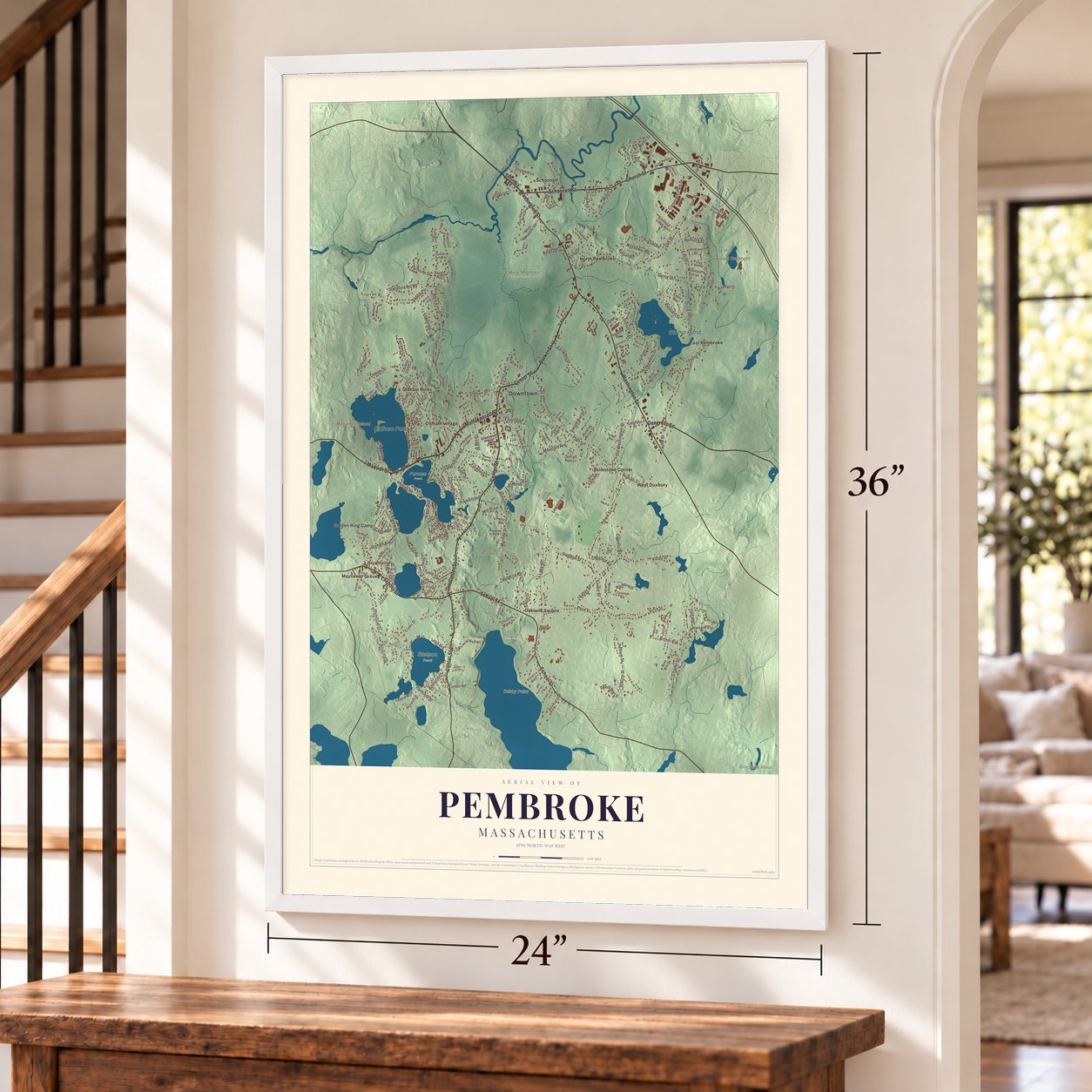 Pembroke, Massachusetts map, 24 x 36 inch print in a white frame by a staircase