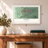 Pepeekeo, Hawaii map, 12 x 18 inch print in a white frame in an entryway