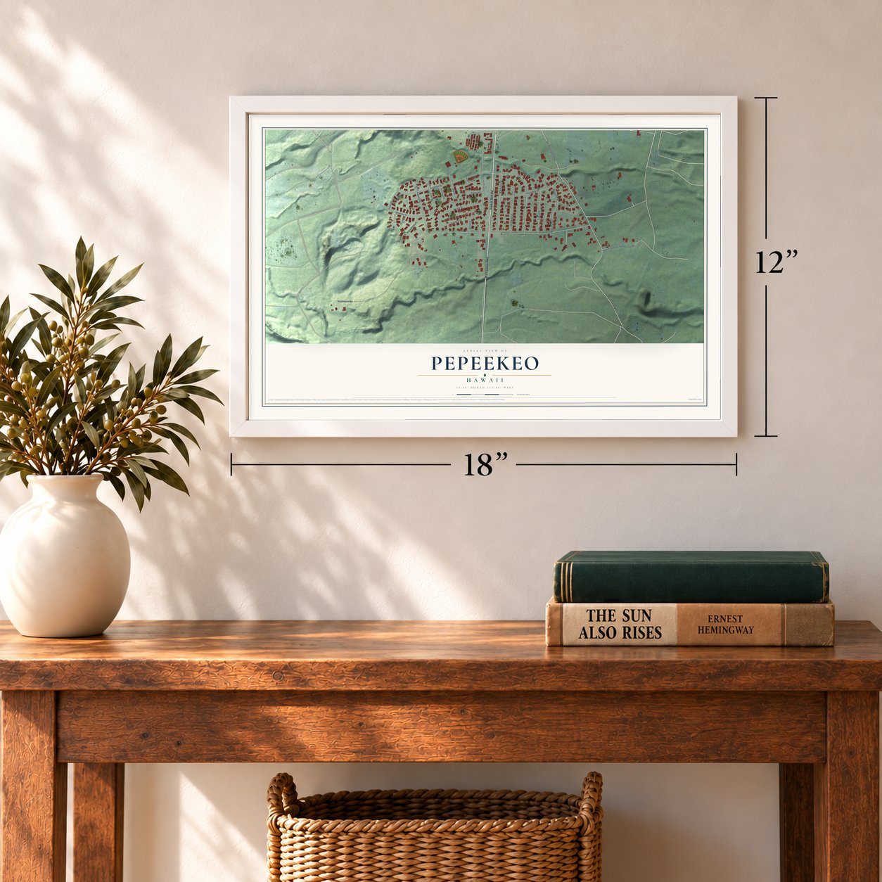 Pepeekeo, Hawaii map, 12 x 18 inch print in a white frame in an entryway